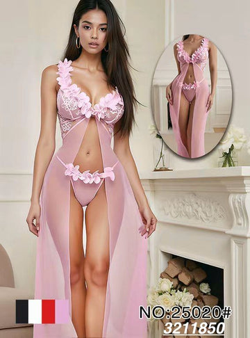 Woman wearing a pink lingerie set with a sheer cover-up in a room setting.